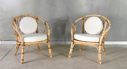 Pair of rattan armchairs with round cushions...