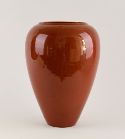 Oblong ceramic vase with red crackle glaze....