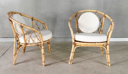 Pair of rattan armchairs with round cushions...