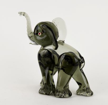 Elephant in polychrome stained glass. 
White...