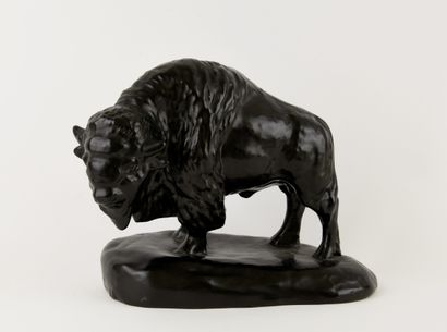 Black glazed ceramic subject featuring a...