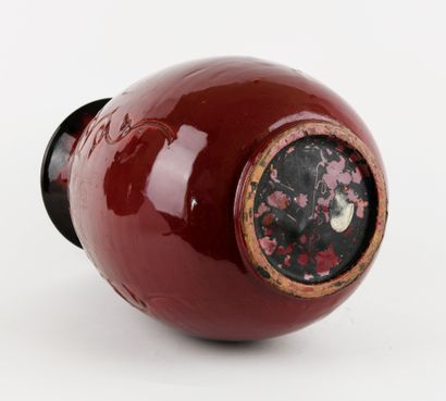 ACCOLAY
Ceramic vase with red glaze and incised...