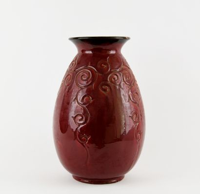ACCOLAY
Ceramic vase with red glaze and incised...