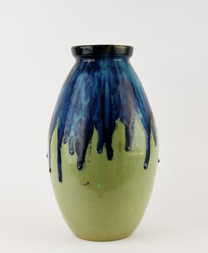 Large flared-neck obus vase in green-glazed...