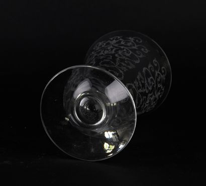 BACCARAT.
Crystal vase with engraved scrolls,...