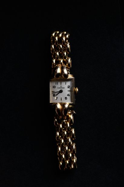 OMEGA.
Montre en or jaune 18 carats (750...