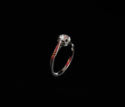 Solitaire set with a half-cut diamond, approx....