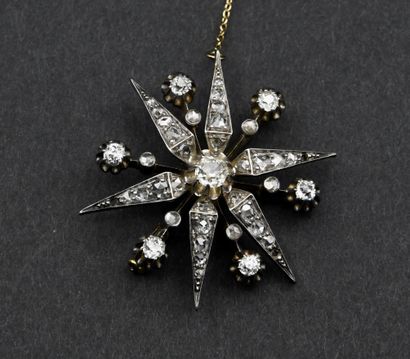 18K (750 mm) yellow gold and silver star...