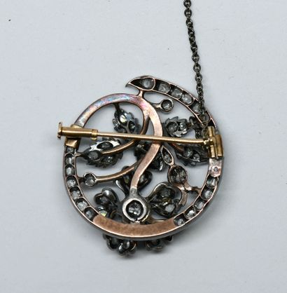 Pink gold and silver circular brooch featuring...