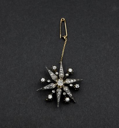 18K (750 mm) yellow gold and silver star...