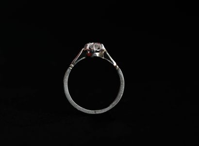 Solitaire set with a half-cut diamond, approx....