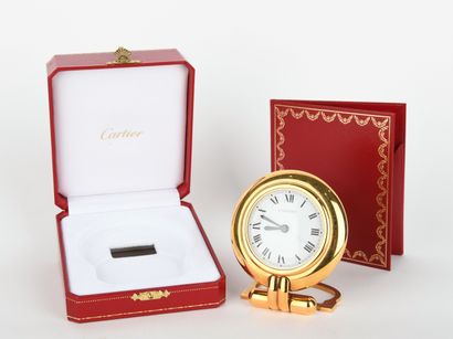CARTIER.
Colisée clock in gilt metal with...
