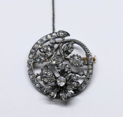 Pink gold and silver circular brooch featuring...