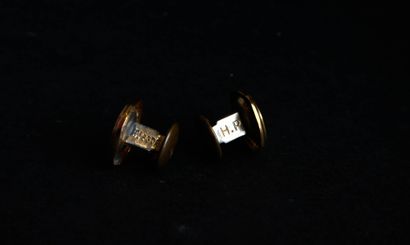 Pair of yellow gold cufflinks with metal...
