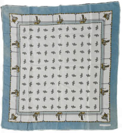 CELINE.
Silk scarf decorated with stirrups.
65...