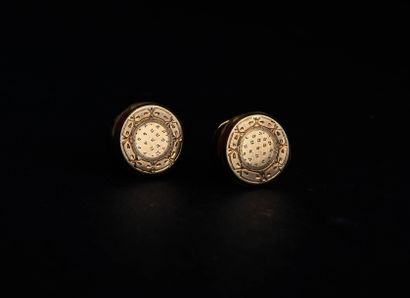 Pair of yellow gold cufflinks with metal...