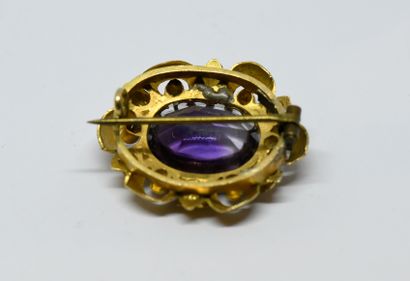 Antique brooch with flower design centered...