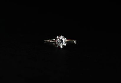 Solitaire set with a half-cut diamond, approx....
