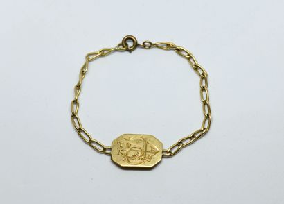 18K (750 thousandths) yellow gold gourmette...