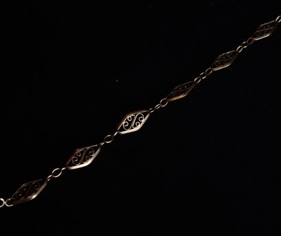 18K (750 thousandths) yellow gold filigree...