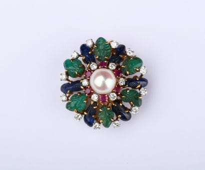 Tutti Frutti round brooch centered on a round...