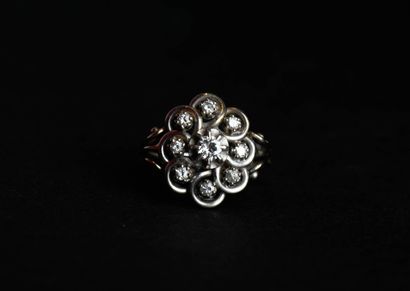 18K (750 thousandths) white gold and platinum...