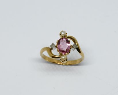 19th c. ring, centered on a pink tourmaline...