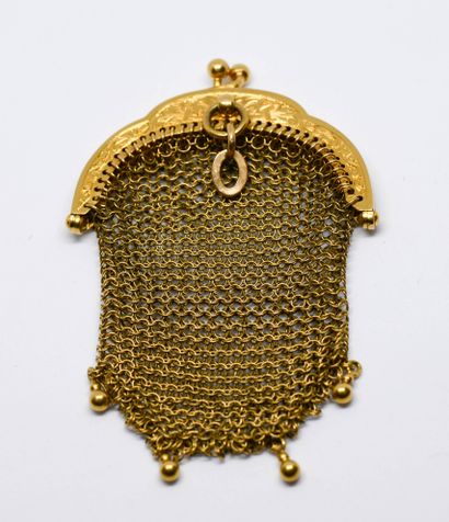 18K (750 thousandths) yellow gold purse
Set...