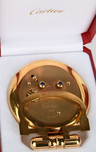 CARTIER.
Colisée clock in gilt metal with...