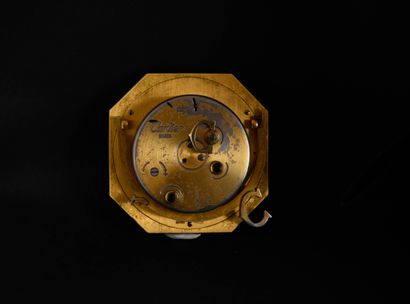 CARTIER.
Gilt-metal octagonal alarm clock...