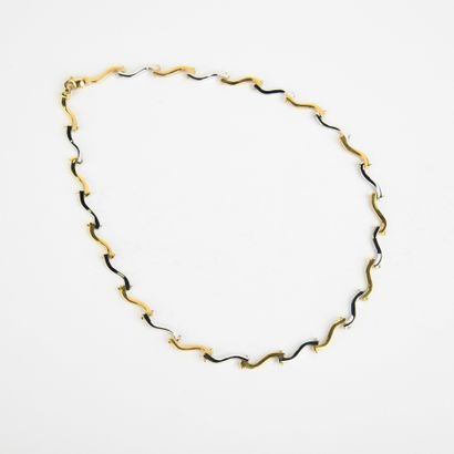 Collier articulé en or jaune et blanc en...