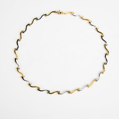 Collier articulé en or jaune et blanc en...