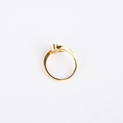 Bague toi et moi en or jaune retenant deux...