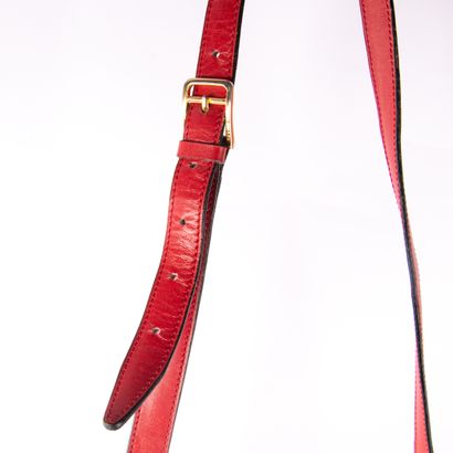 CELINE
Red leather shoulder bag, flap closure...