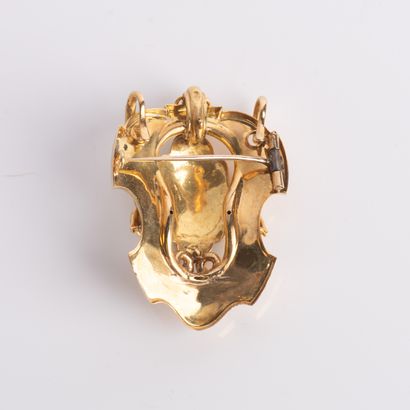 18 K (750 thousandths) yellow gold escutcheon...
