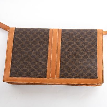 CELINE
Monogram canvas and brown leather...