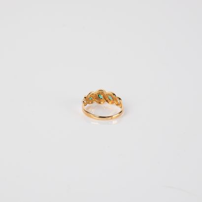River ring with diamonds and three emeralds,...