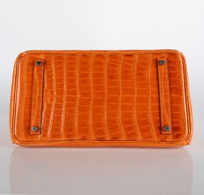 HERMES
Birkin 35 bag in orange crocodile...