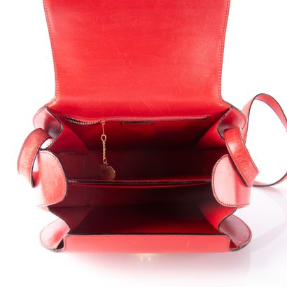 CELINE
Red leather shoulder bag, flap closure...