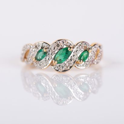 River ring with diamonds and three emeralds,...
