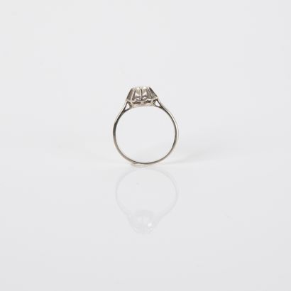 Sun-set solitaire ring with a modern-cut...