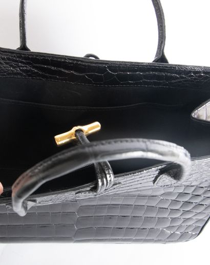 LONGCHAMP
Handbag in the style of the Roseau...