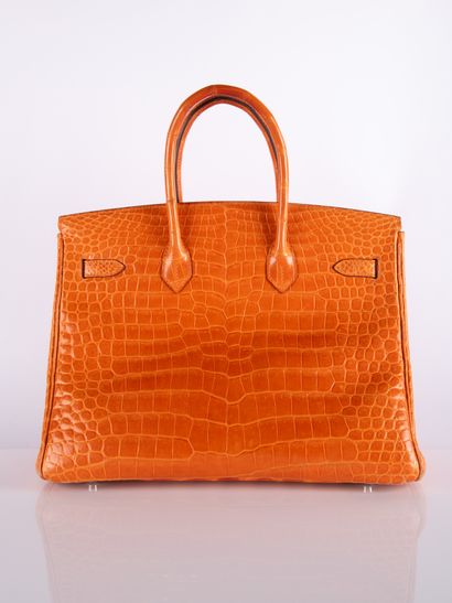 HERMES
Birkin 35 bag in orange crocodile...