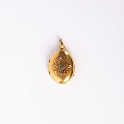 Reliquary pendant in oval yellow gold holding...