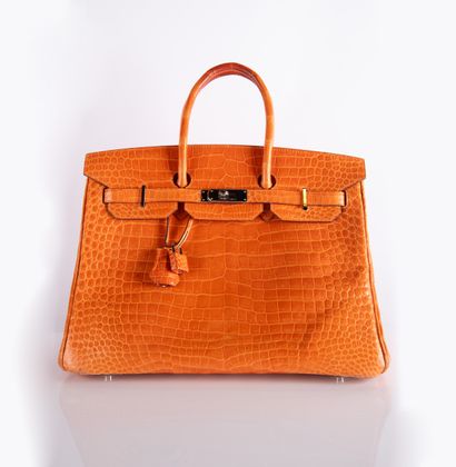 HERMES
Birkin 35 bag in orange crocodile...