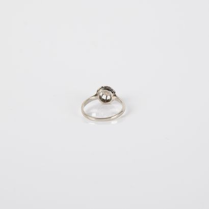 Sun-set solitaire ring with a modern-cut...