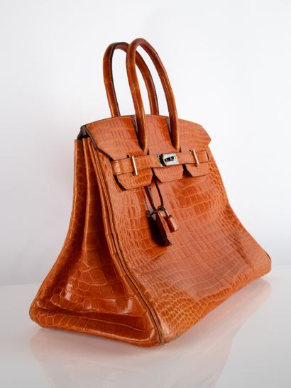 HERMES
Birkin 35 bag in orange crocodile...