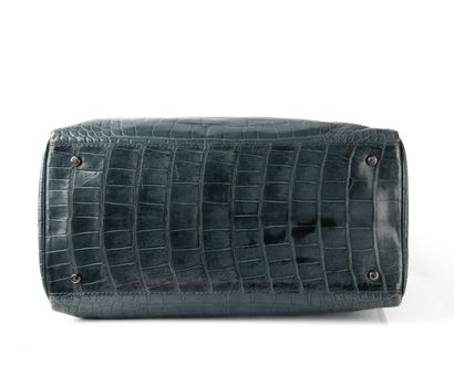 ZILLI
Light blue crocodile travel bag
Silver...