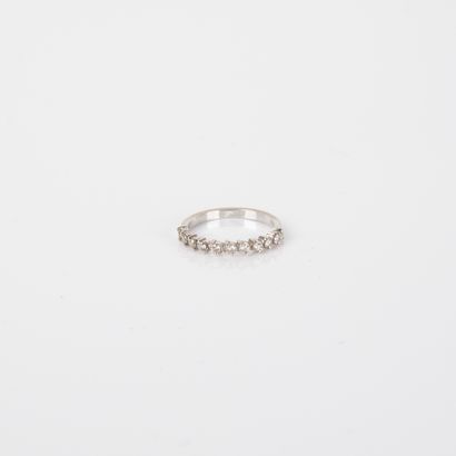 Half wedding band in 18-carat (750 thousandths)...