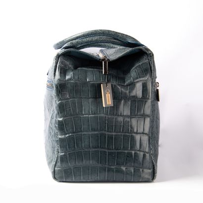ZILLI
Light blue crocodile travel bag
Silver...